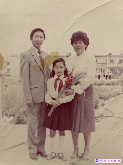 Group of people smiling and hugging together